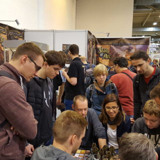 Folks Are Busy Having Fun At The Mythic Games Booth!