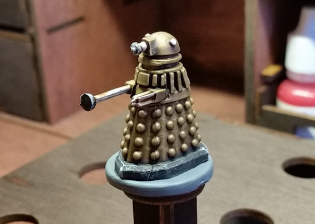 Here's the final version with some details added and the base painted. I think for the rest of the Daleks I'll do the details before the wash.