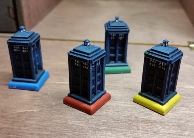 Simple black primer, then blue drybrush. I wasn't originally going to do the windows because they're so small, but I finally relented. I don't think they look great, but good enough for a board game.