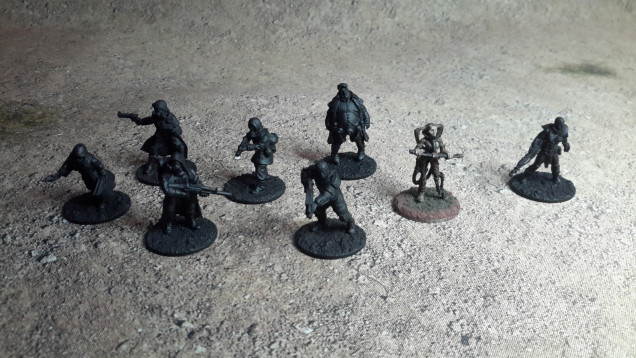 Left to right Brother Vinni miniatures, Hasslefree, and an old Freebooter miniature (the only official figure released) and Crooked Dice