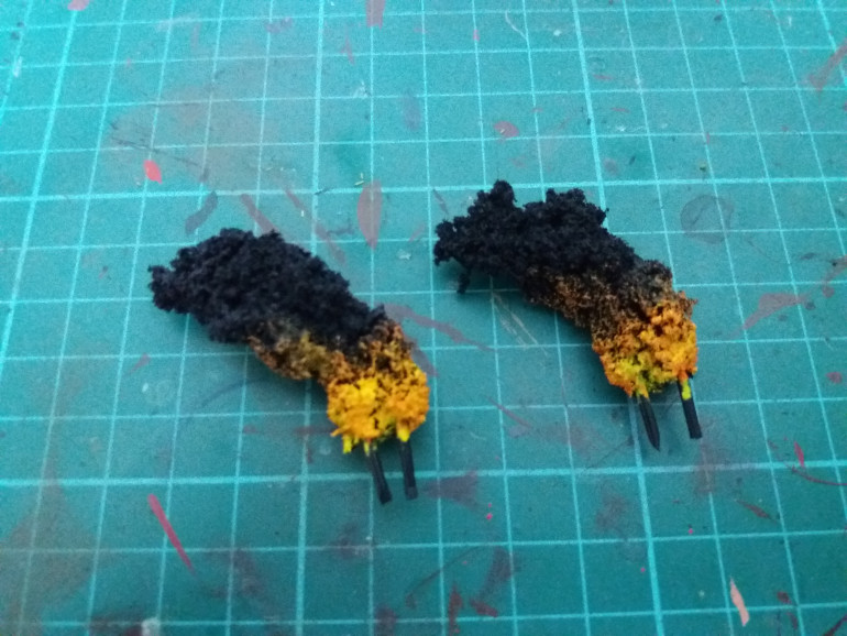 Step 5: Paint over the top of the yellow and also a little higher with an orange, I used Troll Slayer Orange for this.