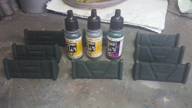 After priming with Halfords Grey Primer (Automobile grey primer for those in the colonies), the barricades were basecoated in a mix of Vallejo Black, Engine Grey and Dark Green, mixed in a ratio of 3/2/1. This gives a nice dark grey with a hint of green.