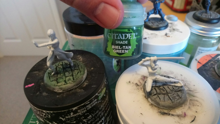 Next I hit the base with a green wash.  I do this to try and add a bit of colour variation to the base so that it isn't only shades of grey.