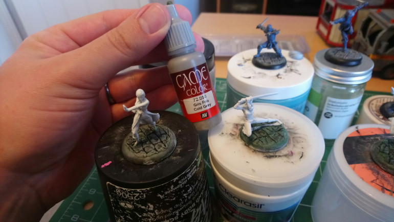 Here I drybrushed Cold Grey lightly over the washes to knock them back, but not so much as to obliterate them altogether.  Hopefully the pic captures that!