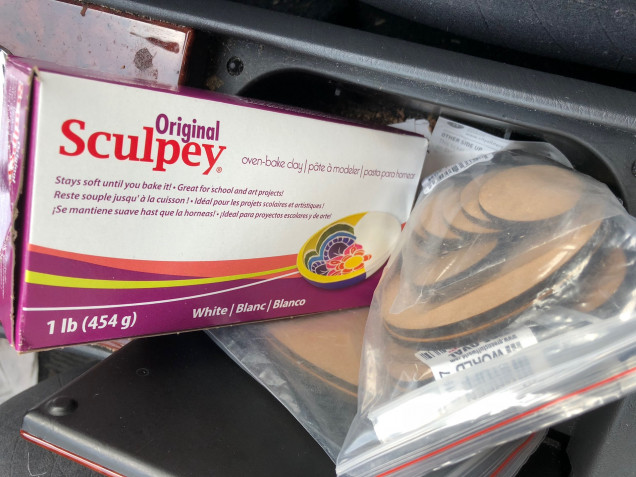 Sculpey works reasonably well, and is simpler/cheaper to use than green stuff. It can be a bit soft though.