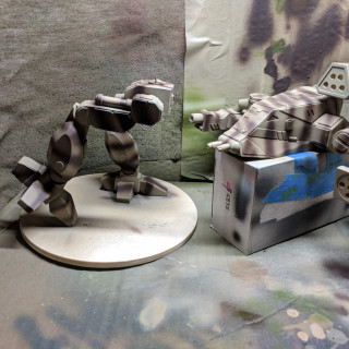 Airbrushing primary color and the camo stripes.