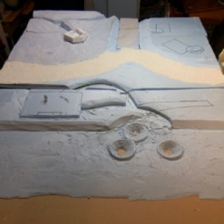 The first rough strokes. Gluing and carving out the insulating foam. Sorry for the small photos. 1-01-2018.