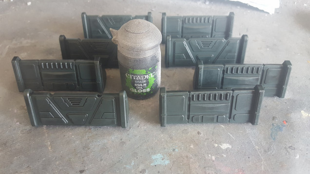 Once the basecolour has dried, give them a wash with GW Gloss Nuln Oil to shade the recesses.