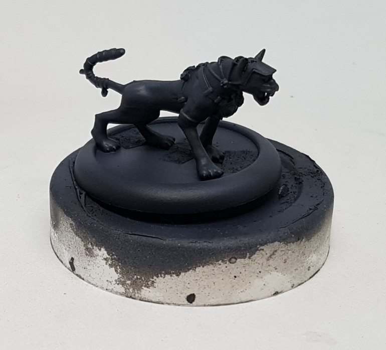 The previous colour had some VMC London Grey and this was used to highlight the model, focusing on the hips, shoulder, neck, head and paws.  The mix was lightened progressively to add increasing highlight