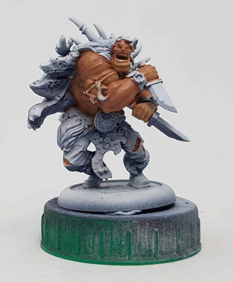 He was washed all over with a wash made from the base mixed with Skorne Red
