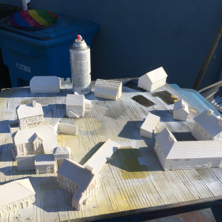 Cleaning and priming of terrain pieces.