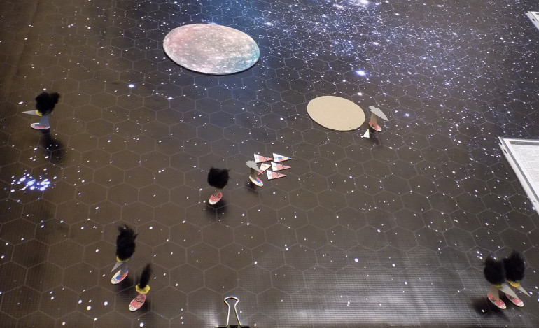 The dogfight begins between the Xin Tian and the Syekyra.  The Xin Jian is currently using the smaller Chernyeva Twelve moonlet to cover her damaged fantail.  