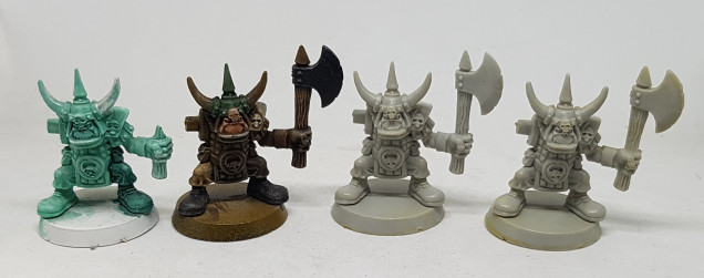 I believe for a brief moment GW produced generic Orks for Fantasy and 40K and it was the weapon arm that denoted the system.  I assume these can be used as Ork Boys if I give them a gun?