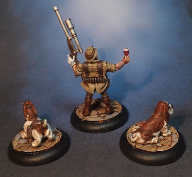 I am rather pleased with how this little group came out.  To be honest, I want more of the hound miniatures for other projects I have in mind.