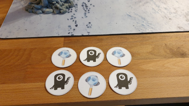 You have 6 Objective tokens take them and shuffle them and without looking at any of them draw 5 of the 6 and put the 6th away without looking at it.