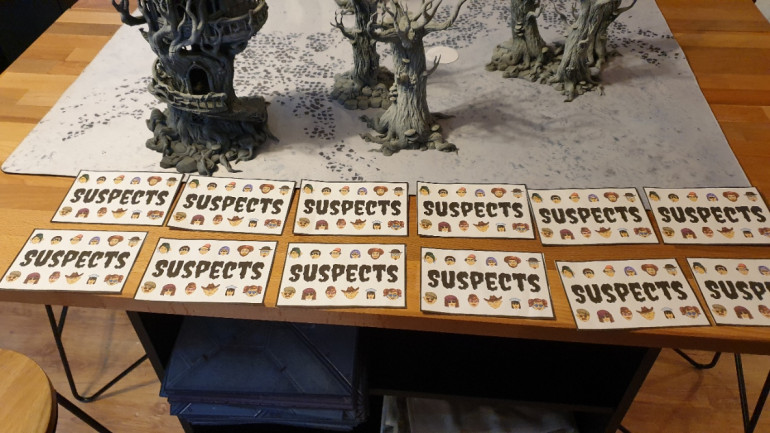 Lay out the Large suspect Cards