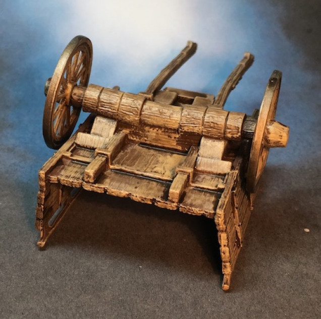 This warping occured just while photos were being shot.  I may replace the wheels with Games Workshp ones or run a metal rod up through the current ones.  Got some problem solving to do before I tackle the second model I have.