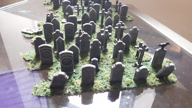 Here we have the flock attached. I started by sprinkling the dark tone around the gravestones. I then sprinkled some mid tone and finally a tiny dash of bright tone. This was to try and give some semblance of depth.