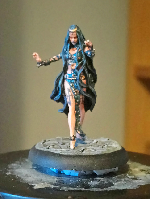 ..And here is a mostly-done shot of Enchantress who you may know from Suicide Squad. Don't worry, there is no model of the weird and shiny-looking version she turns into, just the much more iconic looking 'muddy witch'.  I actually painted mine to be a bit shinier than the movie look, I was going for something a bit ethereal looking with the blue highlighted hair and strange blue metals.  I'll try to get a decent shot of the finished mini at some point.