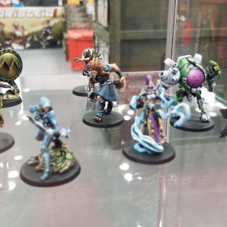Infinity And Aristeia Get Played At The Corvus Belli Stand