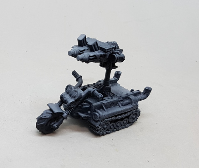 My Wartrakk came with a broken Las Cannon, which isn't a legal option any more.  I improvised a Twin Shoota for it out of two Bolters and a coffee stirrer.  Perhaps I should have added some green stuff for strength?