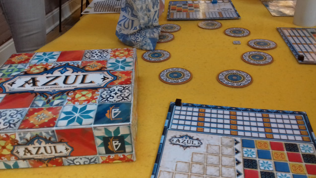 A fantastic little game I was introduced to called Azul, where you compete to make mosaics scoring points. I now plan to add this to my collection.