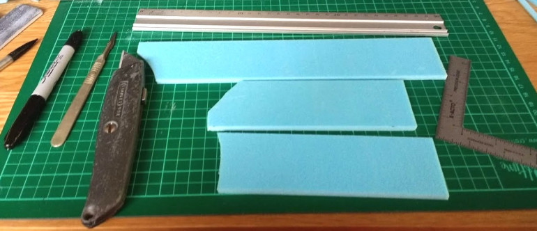 The basic building material is 5mm thick extruded Styrofoam (Blue Foam), this is easy to cut and shape and the surface can be carved and textured to give nice looking effects like brick or stone work.  I started by cutting some 50mm wide strips from a sheet. 