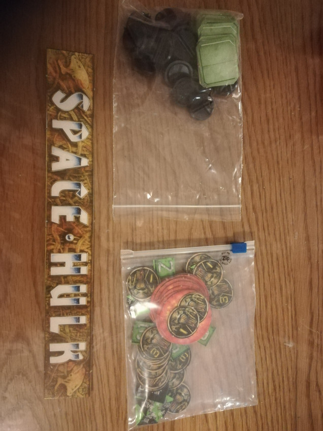 The components have been bagged up and the cardboard doors come with stands. I will probably use the tokens but will replace the doors for some resin pieces. 