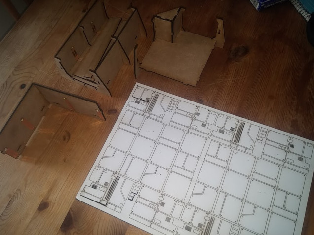 Laser cut mdf and cardboard to create panels