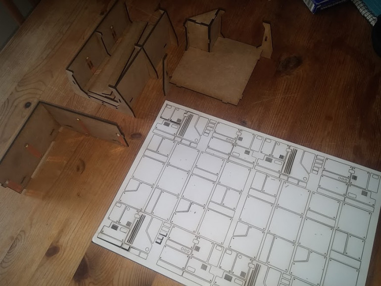 Laser cut mdf and cardboard to create panels