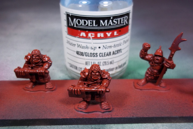 Gloss varnish to protect the ghost tint and to push the ink wash into the recesses.