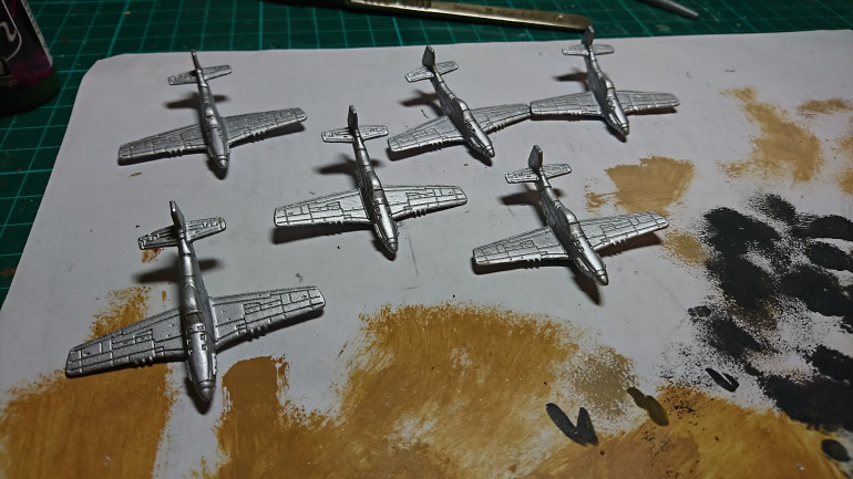 First up using Vallejo Model Air Aluminium to base coat all the planes.