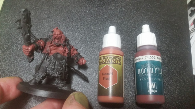 It's a little unclear, but these two paints were mixed roughly 1 to 1.