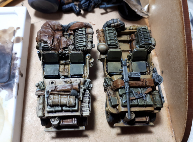 Time to grab a piece of blister pack foam and get dabbing. The jeep on the left has been attacked with some dark sand.