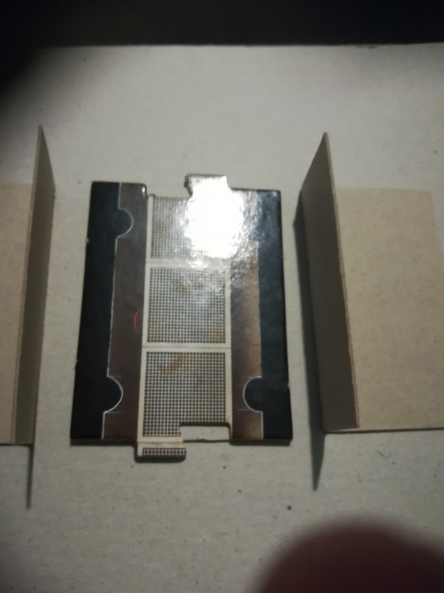 I then glued the other piece of card to the bottom of the tile and glued the right angles also. 