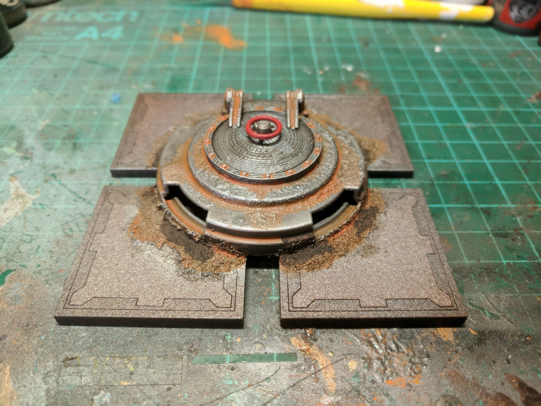 Glued the pieces together and added one of the hatch handles from the Necromunda underhive kit to top it off. Sprayed the whole thing in Lead Belcher and weathered it with the usual combination of washes and added in some watered down skrag brown and rust effect paints before finally gluing the piece to 4 tiles from the board.