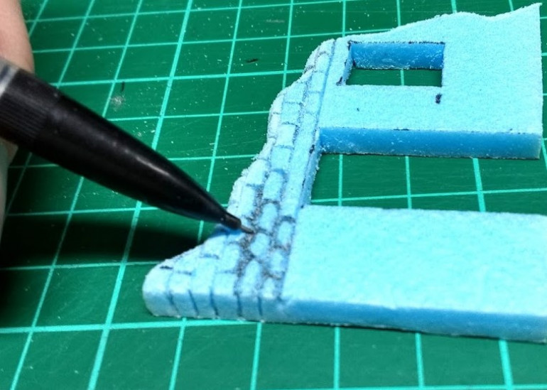 This will leave you with a nice neat regular looking bit of masonry. To age the brickwork and make it look a bit more irregular/rustic or more like stone, the edges of the bricks can be modified. Use the sculpting tool (I usually use a pencil) to press around and round over the edge of the individual bricks. This can take a while, but it adds a lot of character. Large areas of these walls will be covered with plaster/render, so the detail only needs to be carved into the exposed brick work around the collapsed edges and on any patches where the plaster has eroded/fell off. 