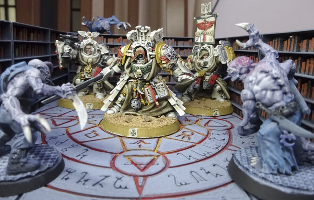 The reinforcement squads of the Deathwing begin to teleport immediately to the facilities of Namekh-48. The librarian Thenebrum unleashes psychic vengeance on the xenos abominations and incinerates all the books of the wicked archive of the cult.