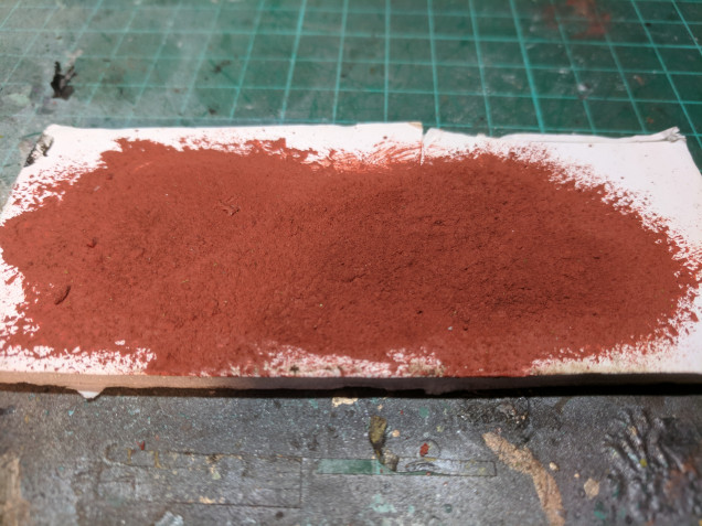When applied in thick layers the iron powder and weathering powders build up a rough texture and when dry the paint has a slightly powdery look.