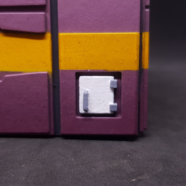 Rear first aid box - Taking this up to white from a dark plum colour is a nightmare I need to do this off model then attach it.