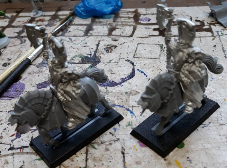 ...and a couple mounted. regrettably their left arms are lost to history, so some conversion work would be necessary.