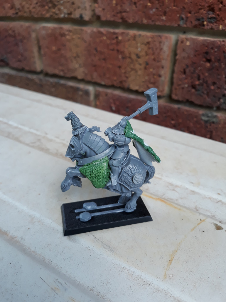 Grandmaster of the White Wolf last week with the first round of greenstuff and parts conversion...