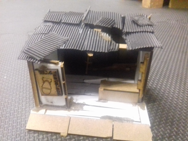My first scratch built piece building for Fallout. I thought a traders stand would be easy to do. It was a simple construction made from foam board and various off cuts from MDF kits just plasted on it.
