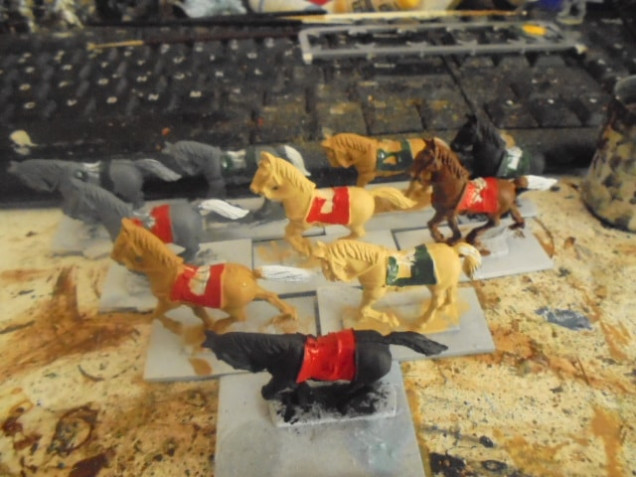 The Horses. Green for Unit A. Red for Unit B. I don't Paint Saddles. I Tend not to Paint Things I'm Going to Cover in Glue and Stick a Mini on.
