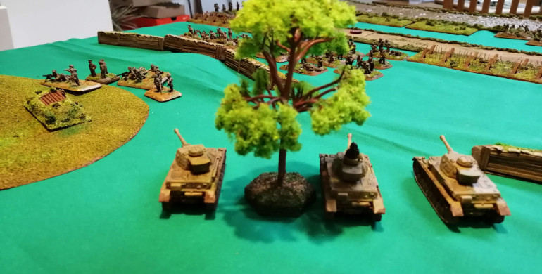 Panzer IVs threatening the US Infantry