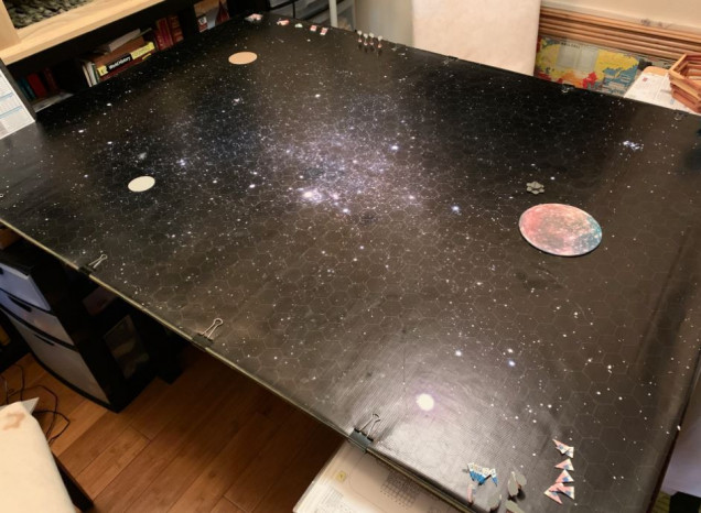 So here is our imminent battle space.  The game mat is 44 hexes long, representing about 8,000 kilometers of space.  For reference, Planet Earth would be about 70 hexes in diameter, about one third of the planet would fit on this map. 