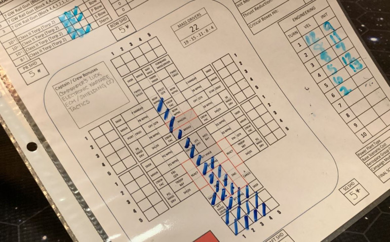 The damage sheet on the Zhang Jia.  Marine fighters went in first, followed by torpedoes, then gunnery (per turn sequence).  The bridge is hit, along with six boxes of critical components.  Thus I need a 4+ to cripple, and happily I roll it.  The Zhang Jia will be back, though, she has Commander's Luck and will eventually make her survival roll on the Warship Recovery Table.  Villains this badass never go quietly into that good night!