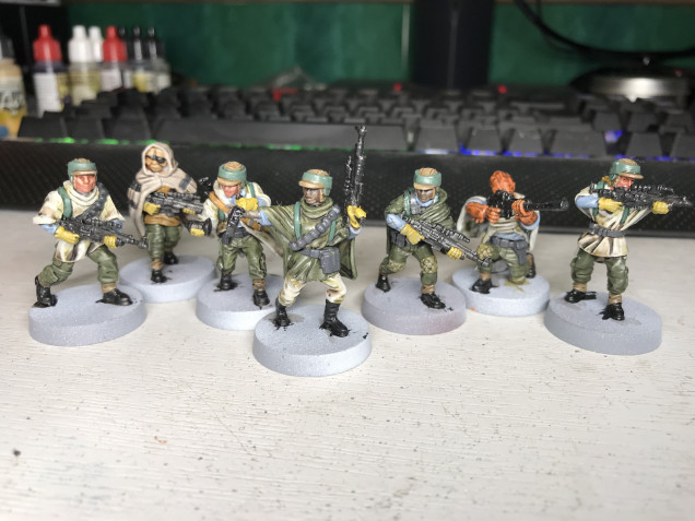 Finally got back to painting, here are the rebels with washes applied