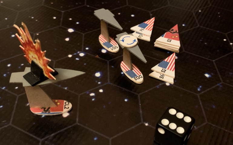 So now the only ships left are the USS Oriskany, and VERY badly damaged USS Princeton, and the empty carrier Zharanyeva.  The Zharanyeva is powering off to the other side of the board to run out the clock for partial victory points, but the scouts are heading in for one last kamikaze effort to hit the unshielded side of the damaged Princeton.  Jenn comes close here, she really does, but the one point of damage that actually gets in just doesn't hit in the right place, and of course all  the scouts are massacred by mass driver point-defense and Marine fighters.  The battle, finally, is over.