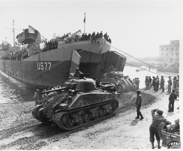 US 1st Armoured Division arriving shortly after the beach head was secured